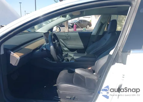 2018 Tesla Model 3 из США, поврежденный, VIN 5YJ3E1EAXJF040286